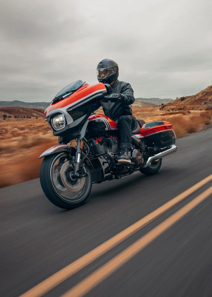 A rider on a touring motorcycle.