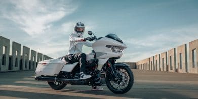 A rider on a touring motorcycle.