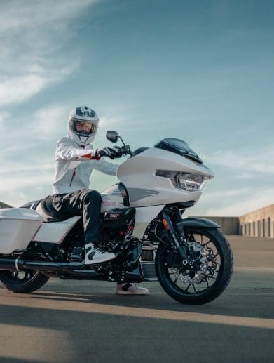 A rider on a touring motorcycle.