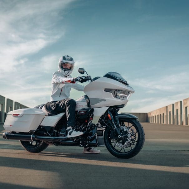 A rider on a touring motorcycle.