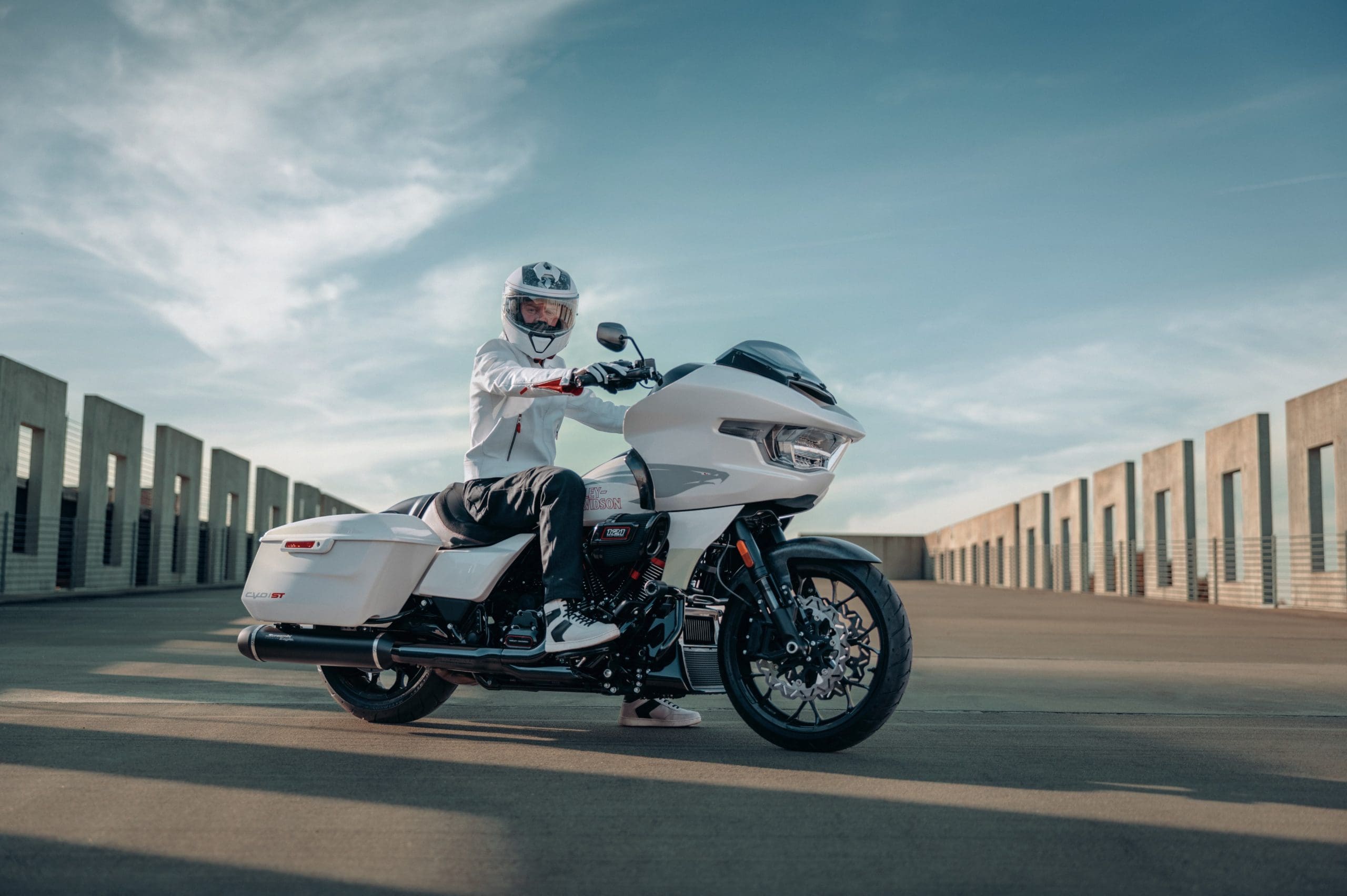 A rider on a touring motorcycle.