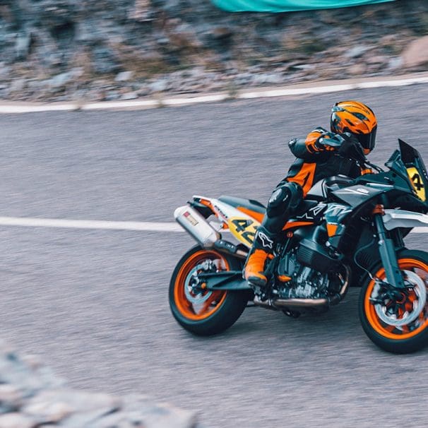 A motorcyclist riding on a road.