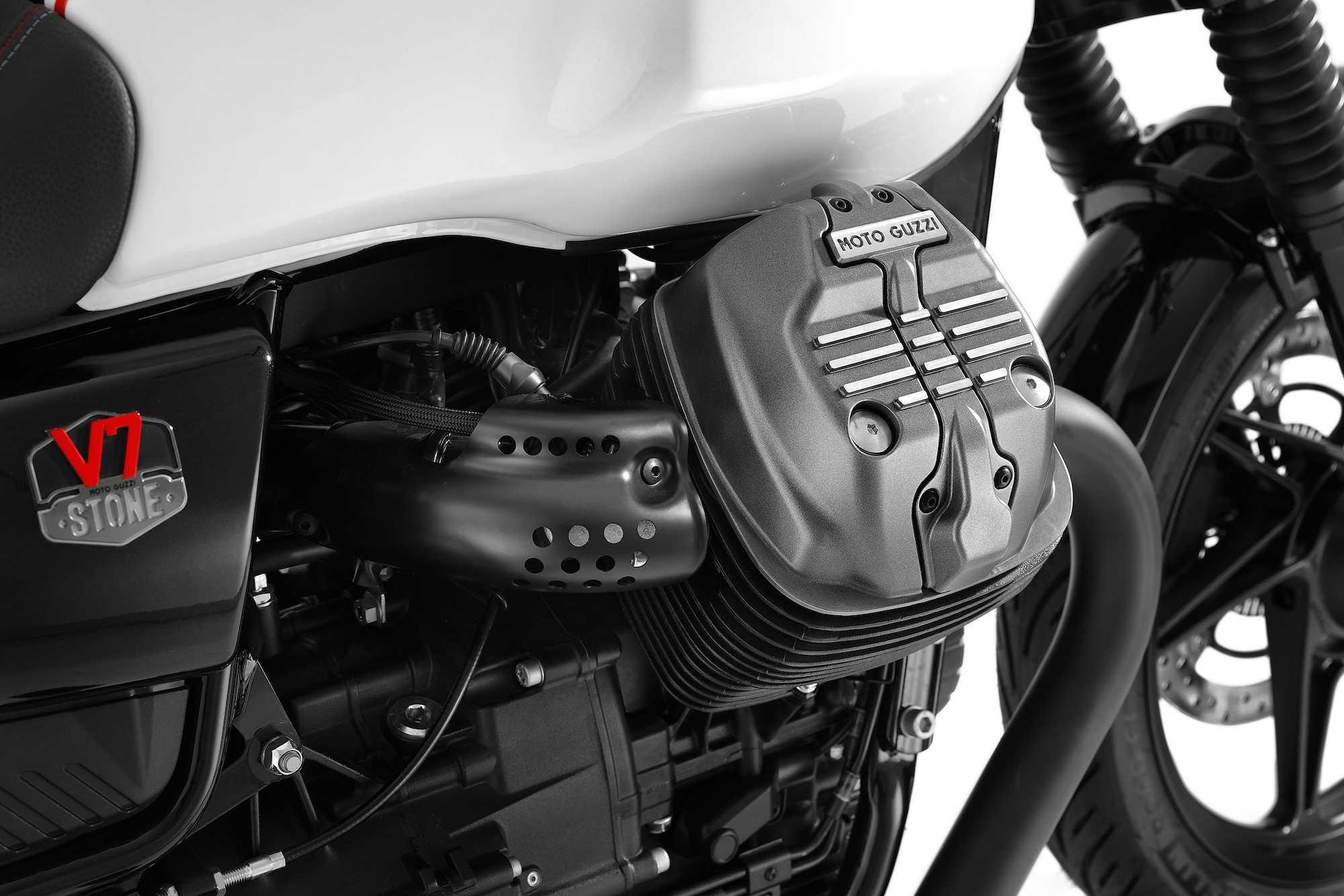 A close-up view of a Moto Guzzi roadster motorcycle.