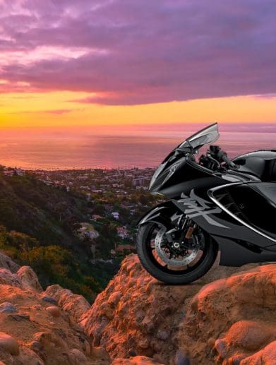 A supersport motorcycle in front of a sunset.