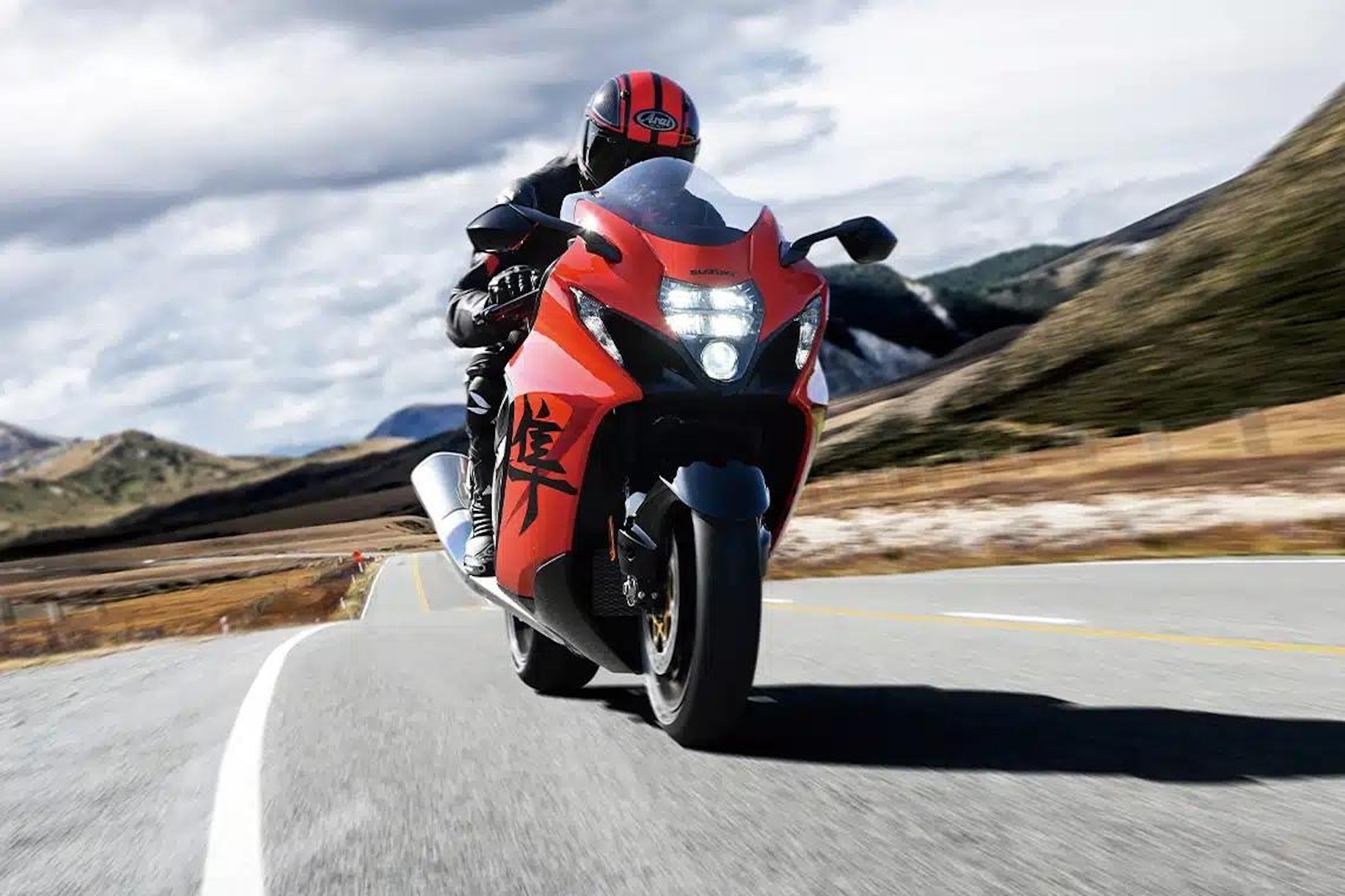 A motorcyclist on the road.