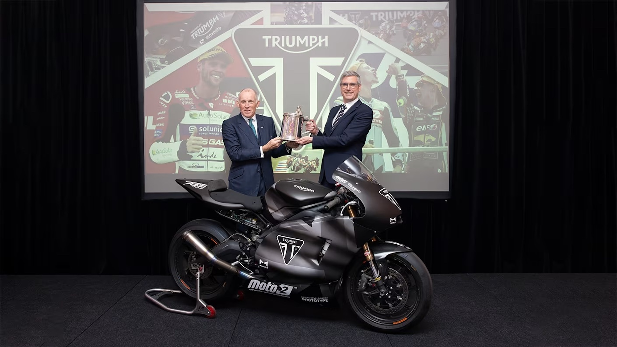 Triumph representatives accepting the Torrens Trophy on behalf of Triumph Motorcycles.