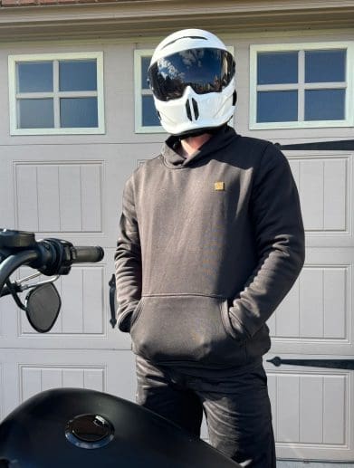 Devan wearing the Defender Motorcycle Hoodie with hands in pocket