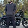 Defender Motorcycle Hoodie front view with hands in pocket