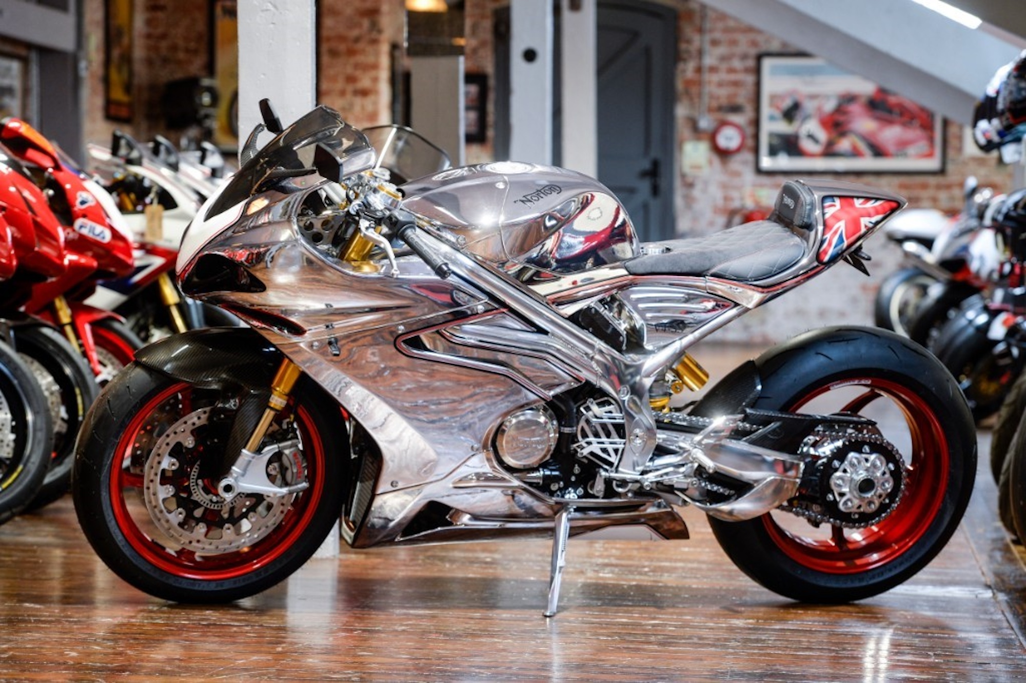 A side view of a chromed motorcycle.