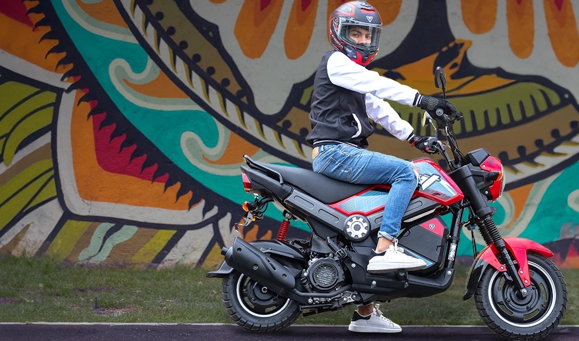 A rider on an Italika motorcycle.