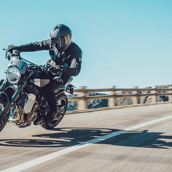 A motorcycle rider on the road.