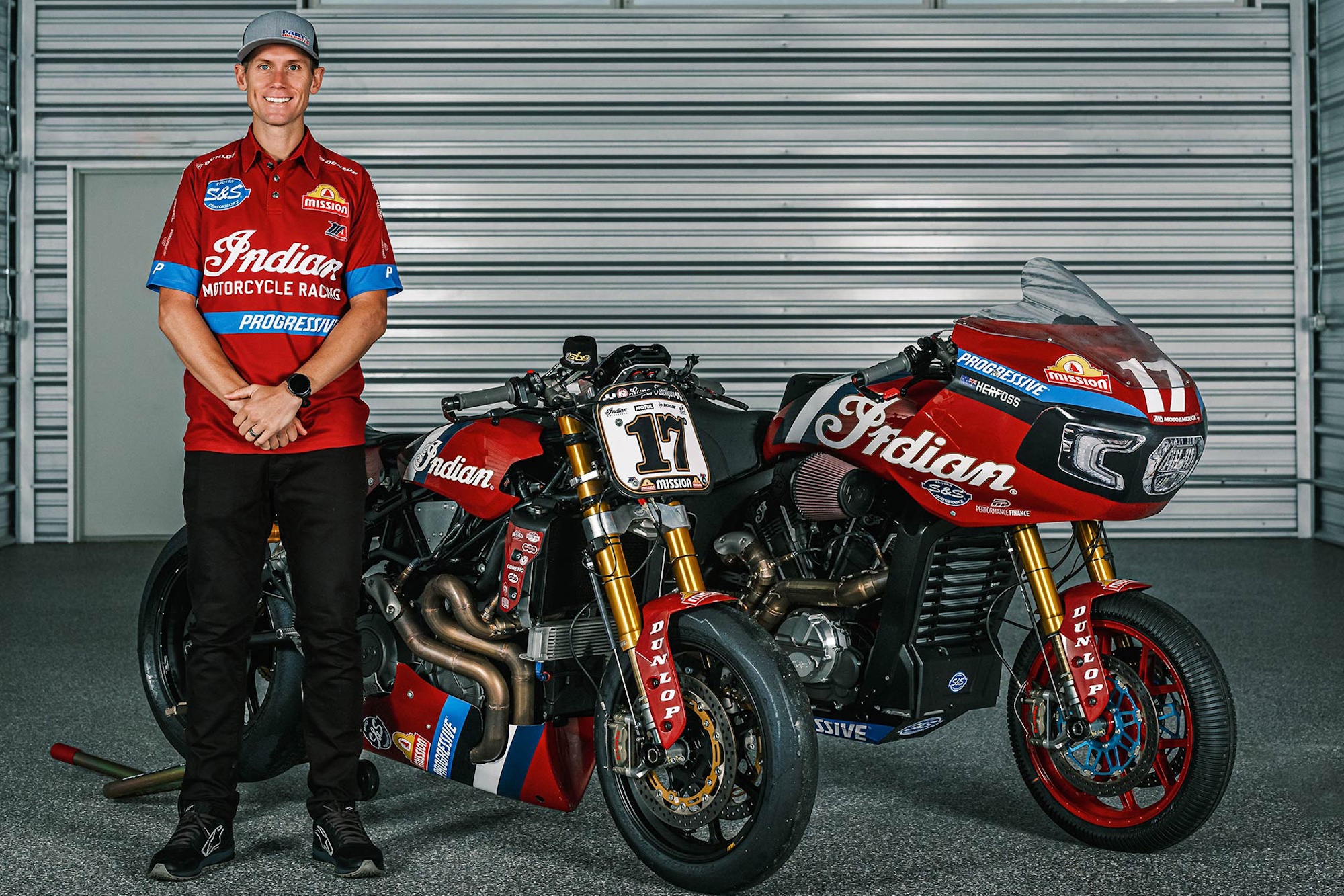 A racer in front of his machine.