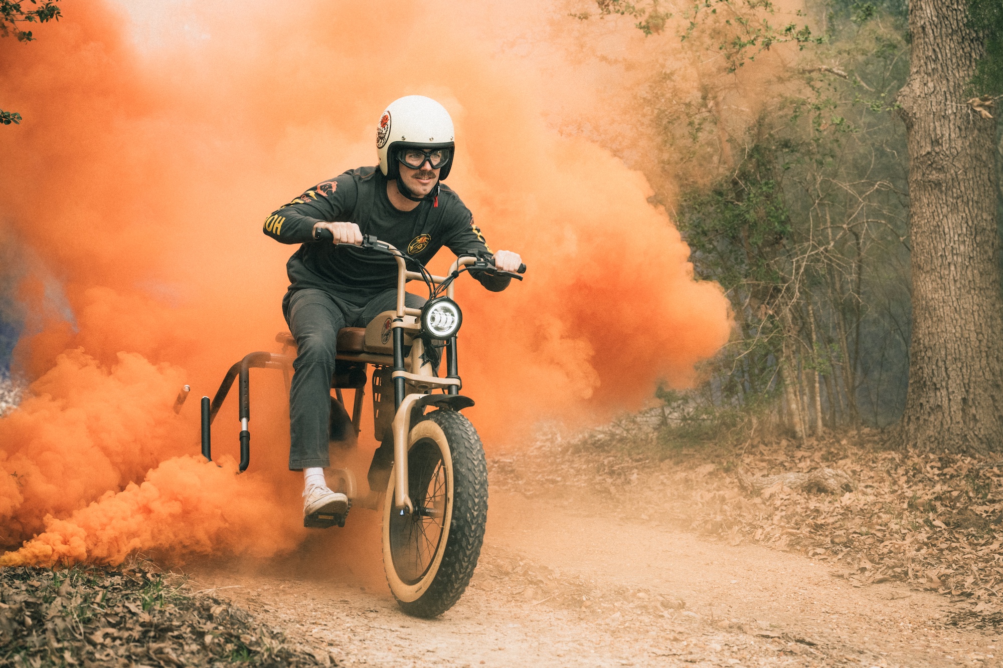 A guy riding an electric motorcycle.