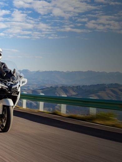 A man riding a motorcycle.