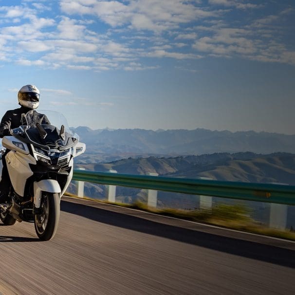 A man riding a motorcycle.