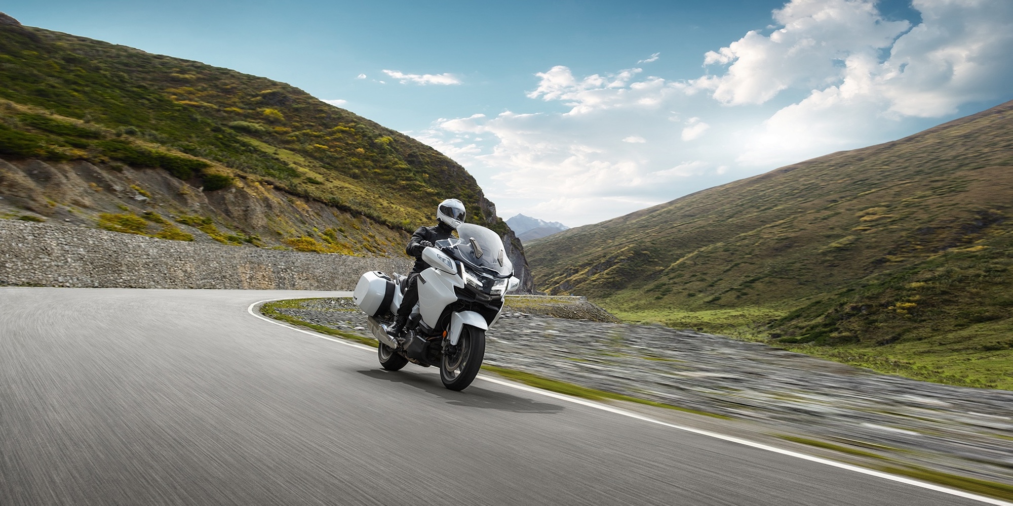 A man riding a motorcycle.