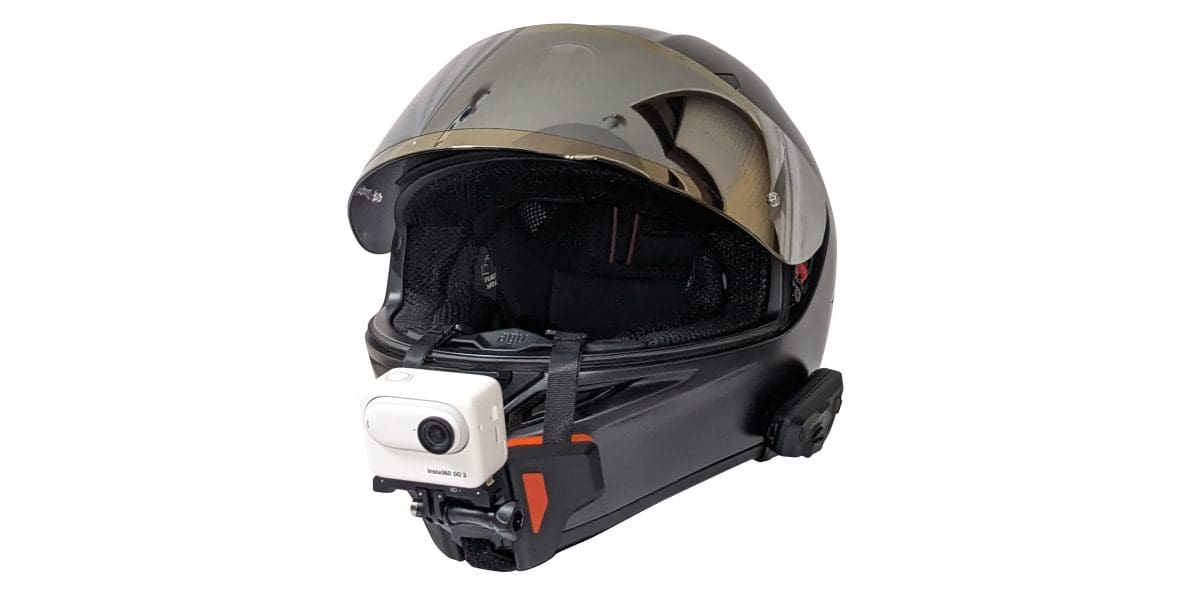 Insta360 GO 3 mounted with a chin mount on an AGV K1 helmet.