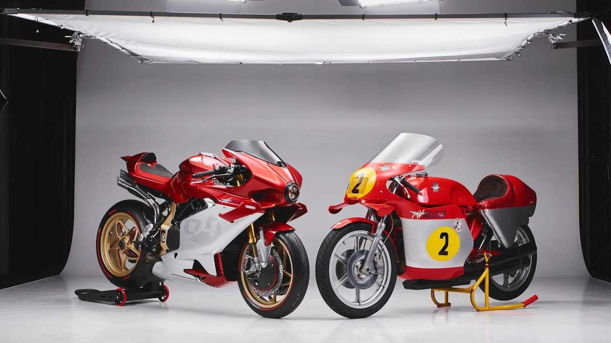 Two motorcycles on a stage.