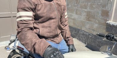 motorcycle rider sitting on harley davidson wearing Joe Rocket Classic 92 Leather Jacket