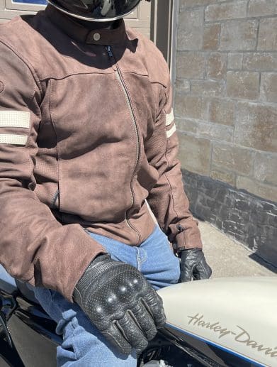motorcycle rider sitting on harley davidson wearing Joe Rocket Classic 92 Leather Jacket