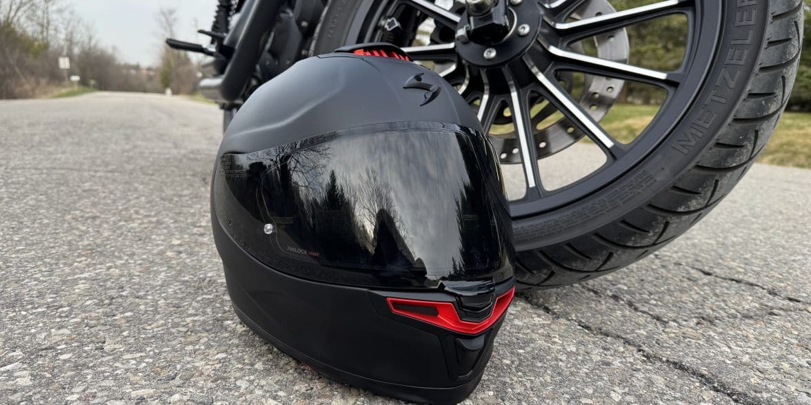 Scorpion EXO-Eclipse resting next to a motorcycle tire