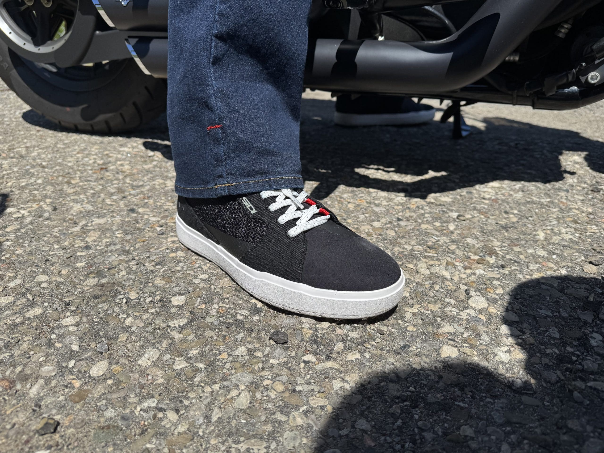 Close up of the Sidi ARX Air Riding shoes with riding shoes covering to show only the toe and some of the laces