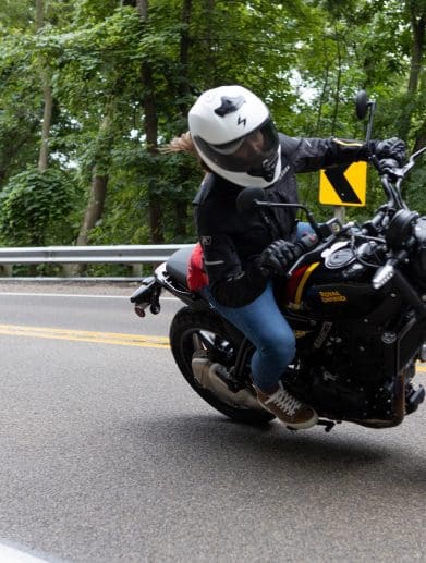 Amanda Quick on a Royal Enfield Guerilla 450 in Wisconsin, prior to the bike's debut.