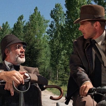 Harrison Ford ("Indiana Jones") and Sean Connery ("Professor Henry Walton Jones, Sr.") sitting on the Ural motorcycle kitted out for "Indiana Jones: The Last Crusade" (1989). Media sourced from Cinema Faith.