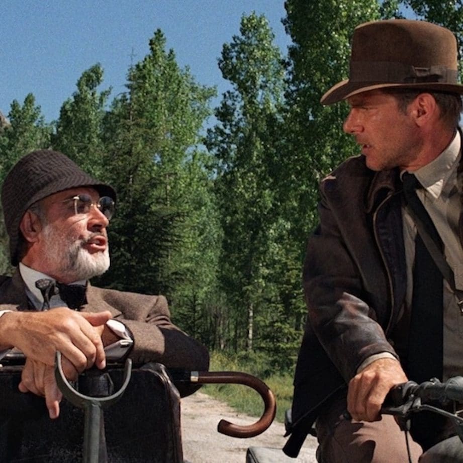 Harrison Ford ("Indiana Jones") and Sean Connery ("Professor Henry Walton Jones, Sr.") sitting on the Ural motorcycle kitted out for "Indiana Jones: The Last Crusade" (1989). Media sourced from Cinema Faith.