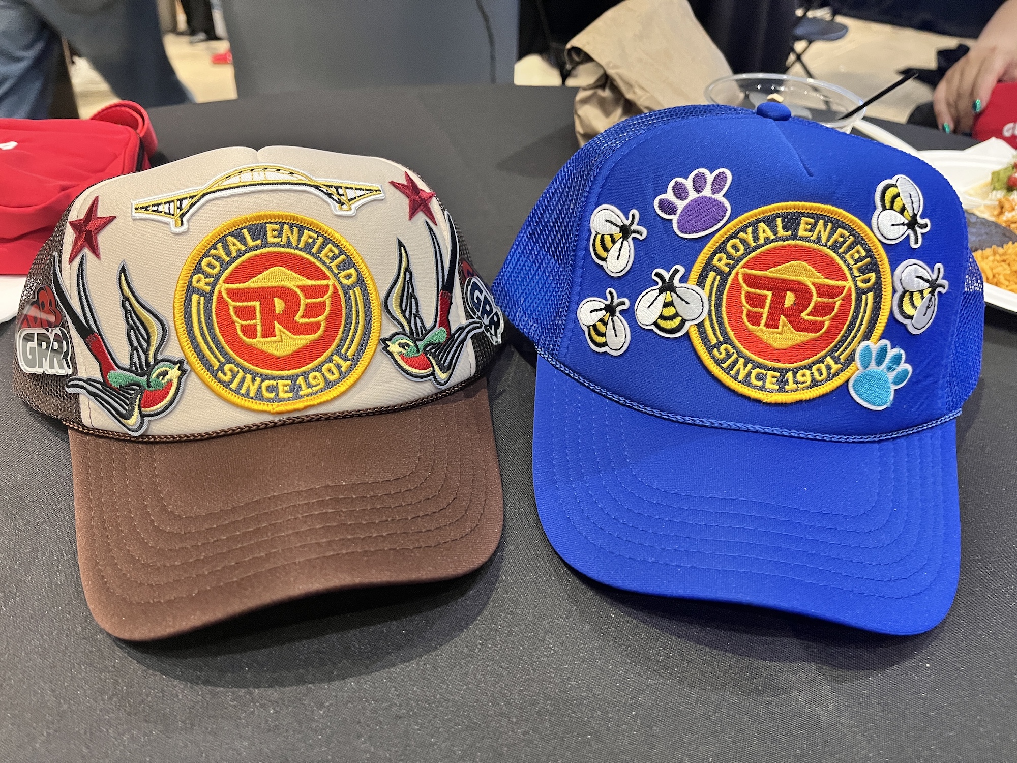 A picture of two custom hats