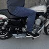 Pando Moto Arnie Slim Blue Jeans worn while sitting on motorcycle
