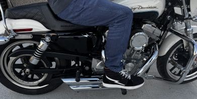 Pando Moto Arnie Slim Blue Jeans worn while sitting on motorcycle