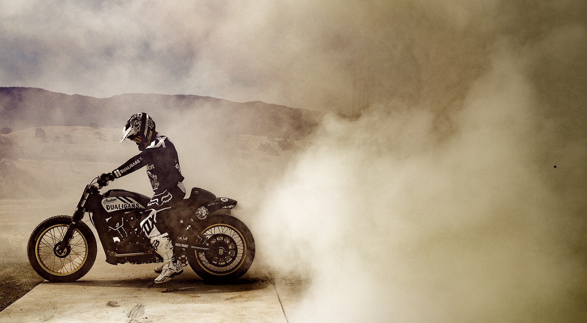 A view of an Indian motorcycle doing a burnie on a "Dueligan." Media sourced from Indian Motorcycles.