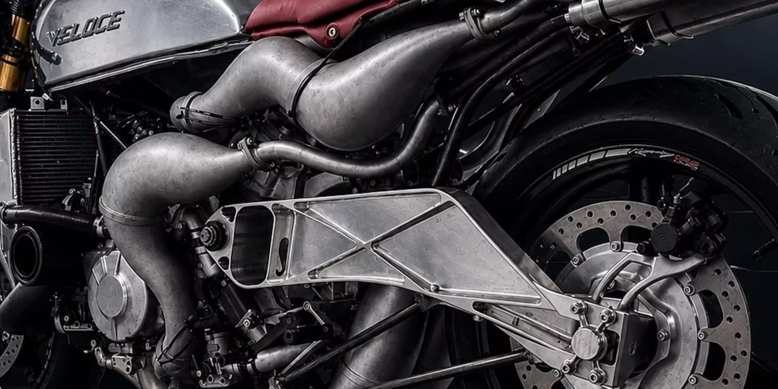 A dynamic side view of the Veloce Apron - a super bike with an insane X formation engine platform.