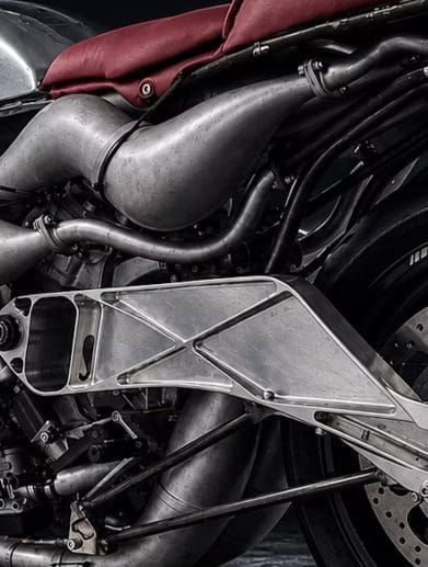 A dynamic side view of the Veloce Apron - a super bike with an insane X formation engine platform.