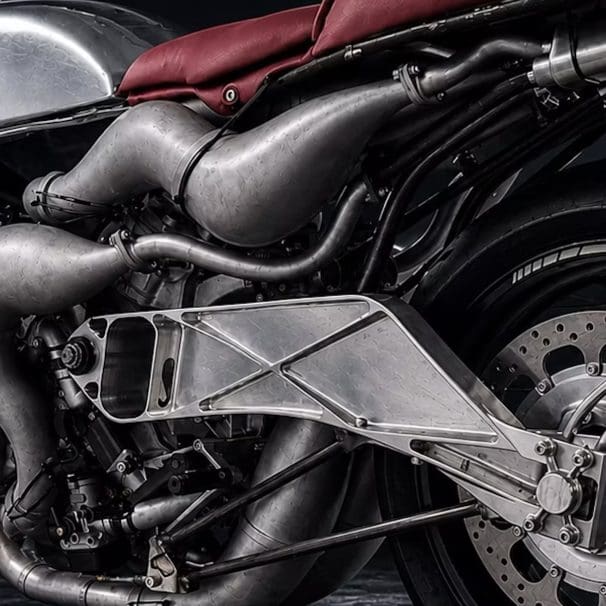 A dynamic side view of the Veloce Apron - a super bike with an insane X formation engine platform.
