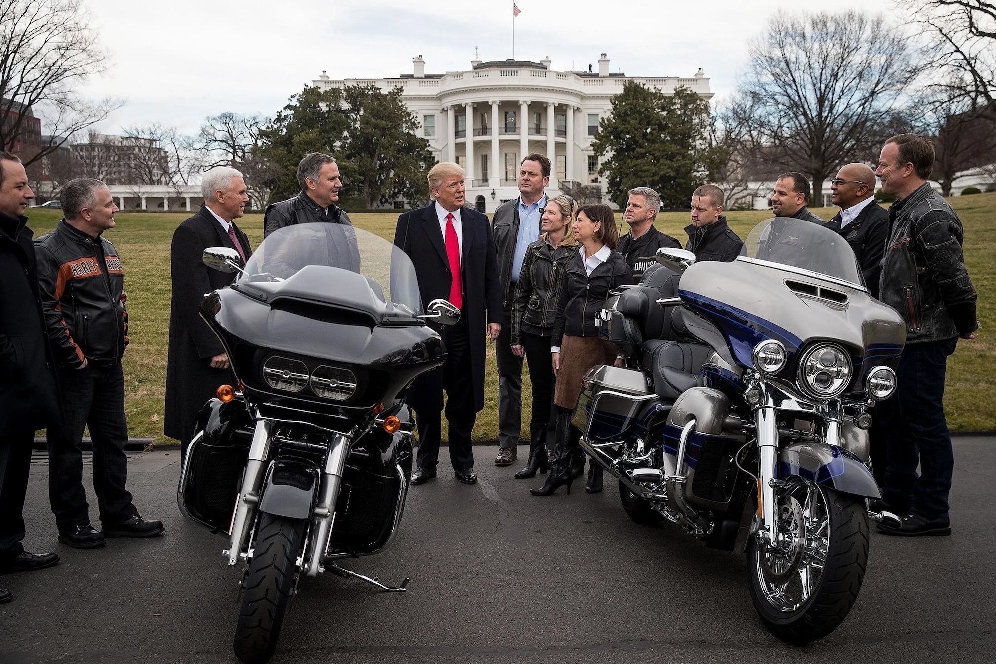 A view of Donald Trump, the current President of the United States, next to Harley-Davidson motorcycles in front of the White House. Media sourced from Bloomberg.